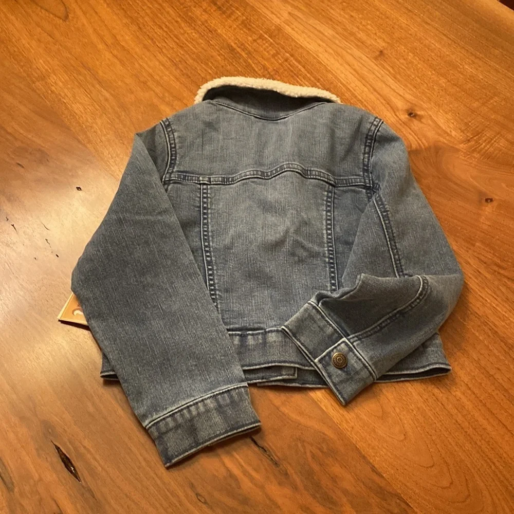 NWT Gymboree jean jacket with Sherpa collar and sunflower appliqués. Size 6